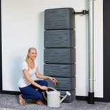 350L Slimline Stone Decor Water Butt Graphite in use